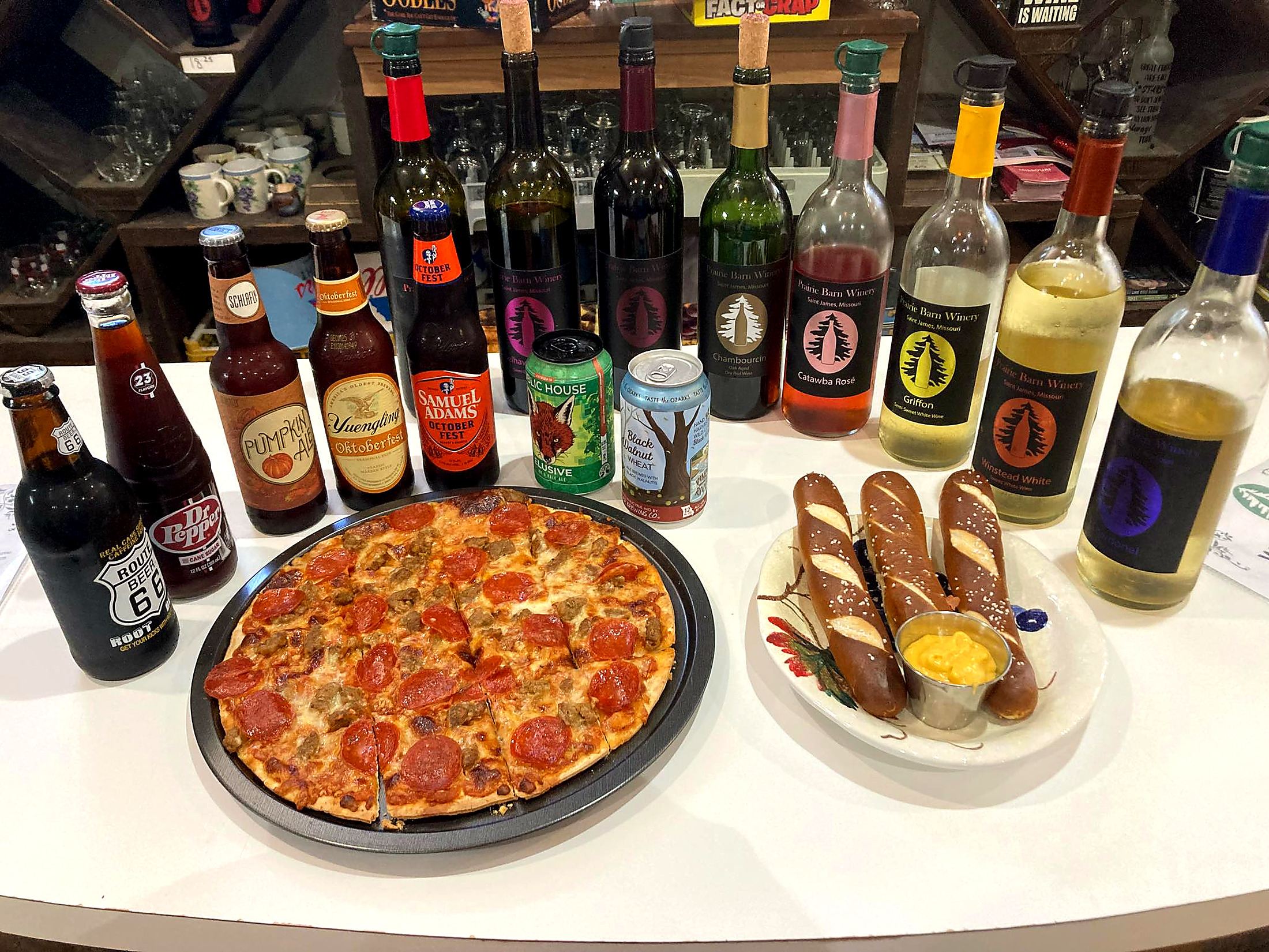 Wine, wine slushies, pizza, and snacks available for room service